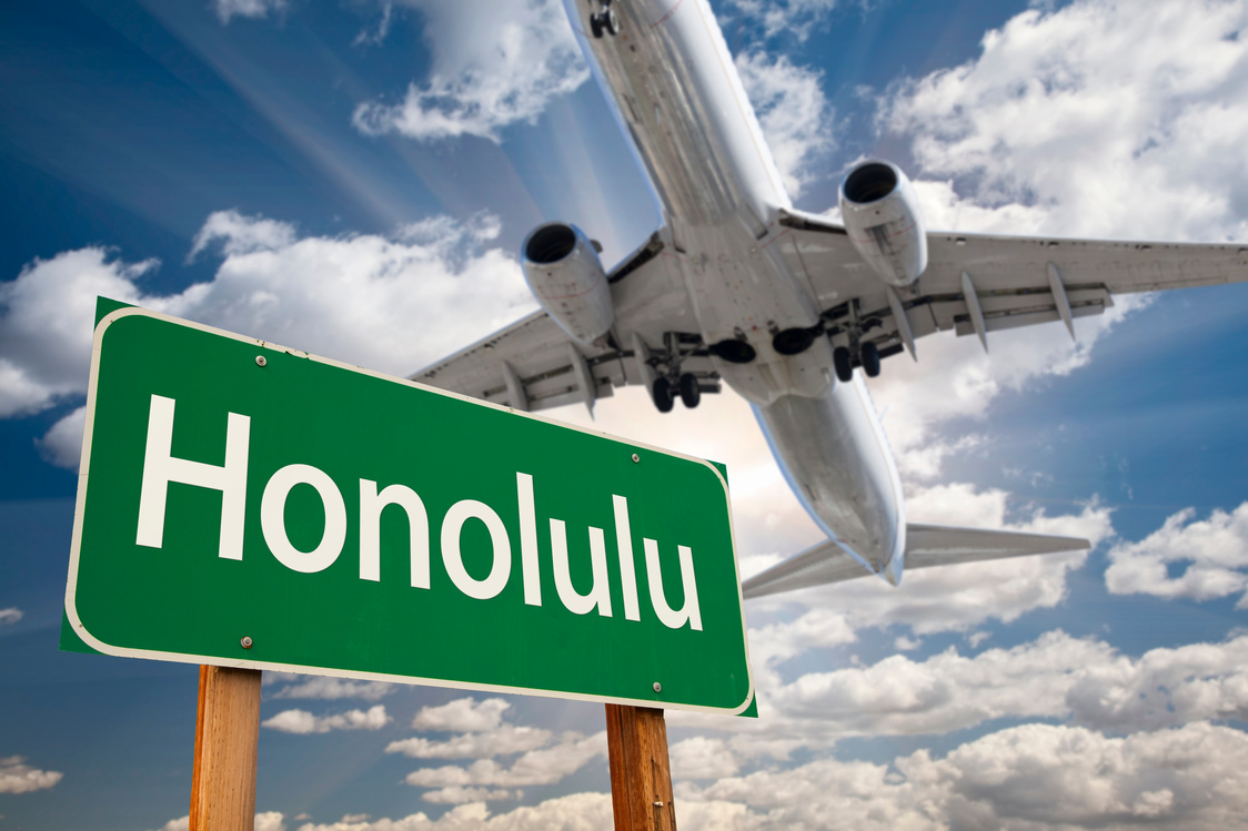 Honolulu Green Road Sign and Airplane Above